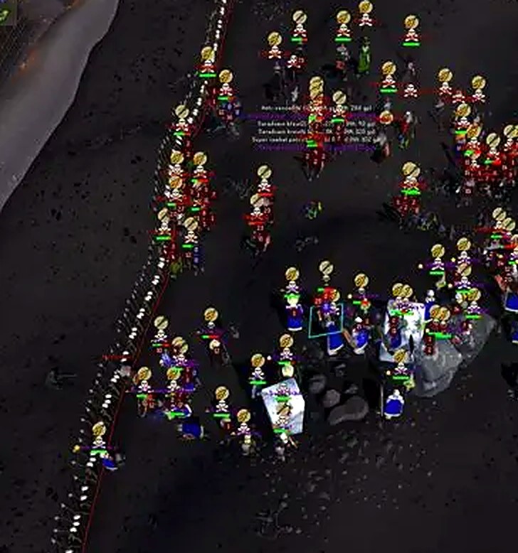 A mass of players fighting in the Wilderness